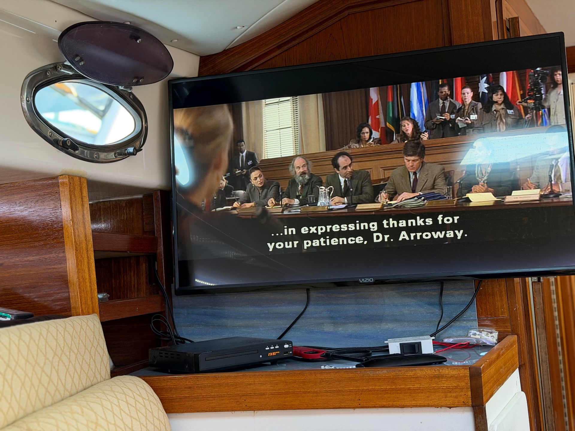 Entertainment system with TV and wood paneling