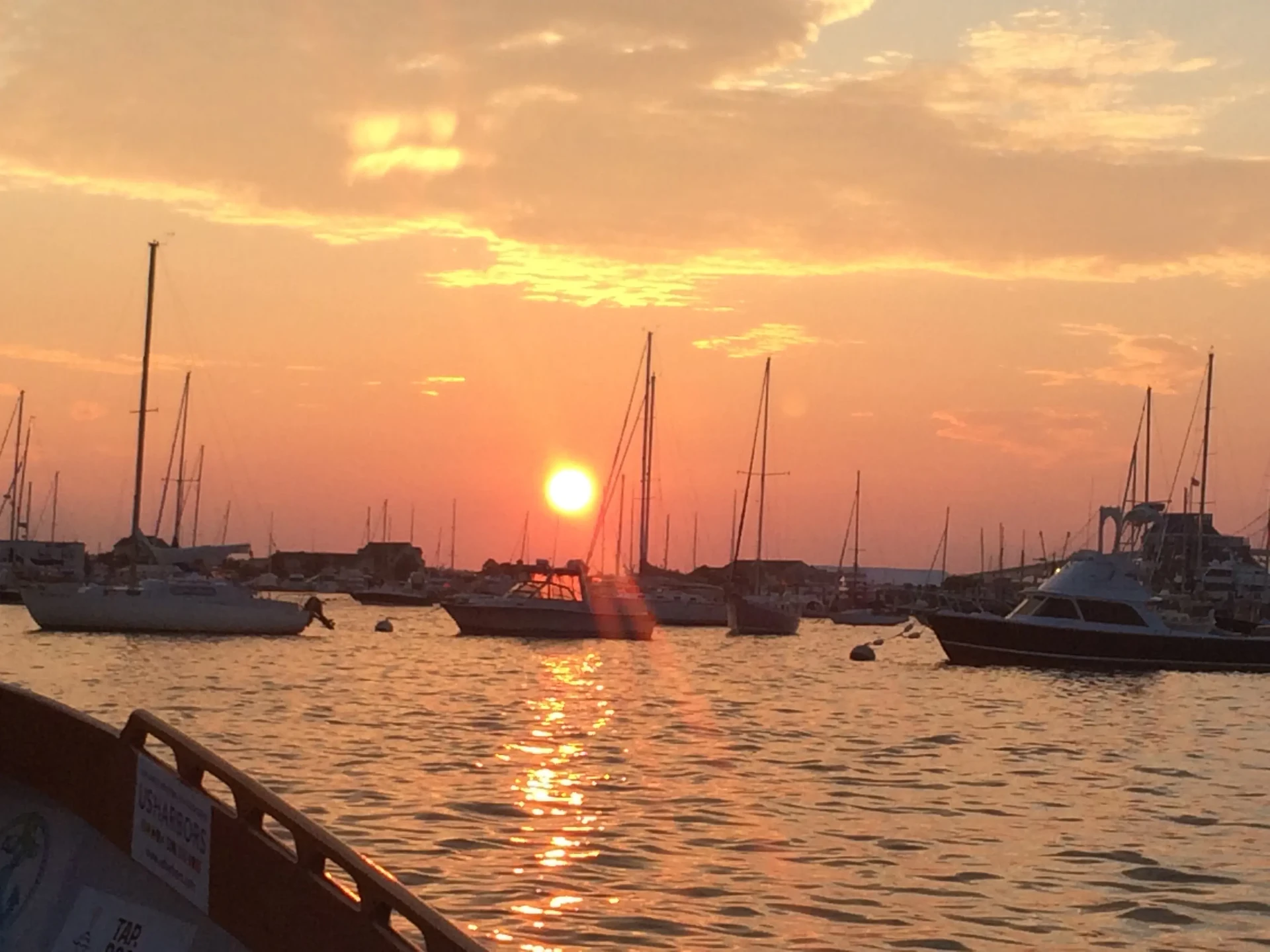 Sunset over boats at the marina