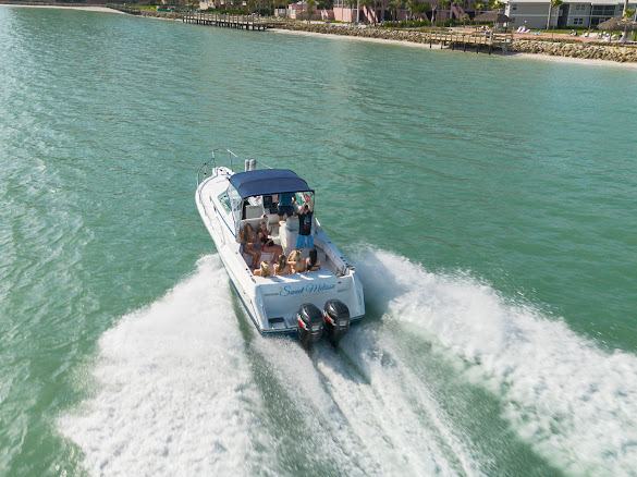 Aerial view of the Sweet Melissa cruising near Marco Island
