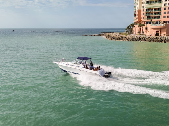 Yacht cruising through blue Marco Island waters